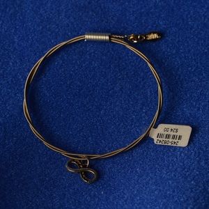 Guitar sting bracelet with infinity charm